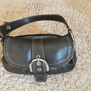 Classic Coach black purse with sky blue lining